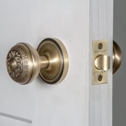 Classic Rosette With Egg & Dart Knob In Antique Brass -Nostalgic Warehouse Shop CLAEAD AB INST