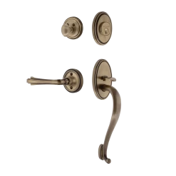 Classic Handleset With S-Grip And Classic Rosette With Fleur Lever In Antique Brass