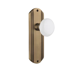 Deco Long Plate With White Porcelain Knob In Antique Brass