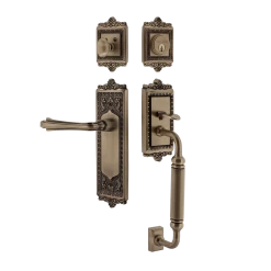 Egg & Dart Handleset With C-Grip And Egg & Dart Long Plate With Fleur Lever In Antique Brass