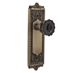 Egg & Dart Long Plate With Black Crystal Knob In Antique Brass