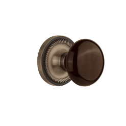 Rope Rosette With Brown Porcelain Knob In Antique Brass